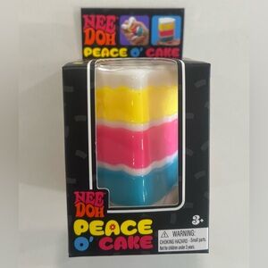VIRAL~ Nee Doh Peace O' Cake Squishy Toy - Multicolor